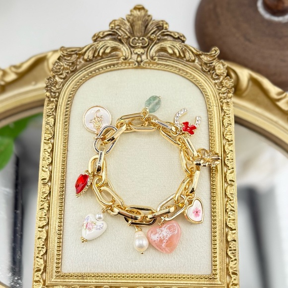 Anthropologie Jewelry - Whimsical Gold Charm Bracelet